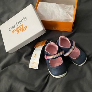 Pair of Carter’s every step shoes